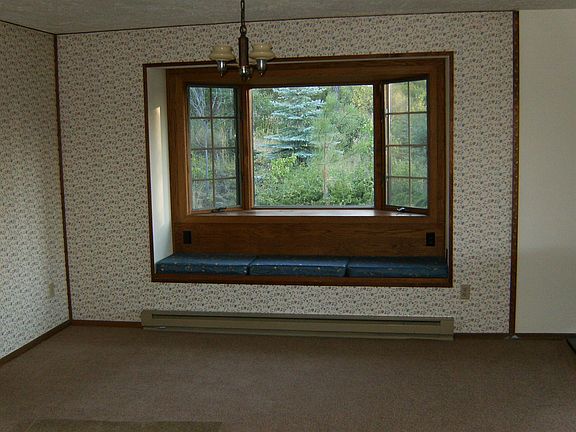 Bay window with woodsy view