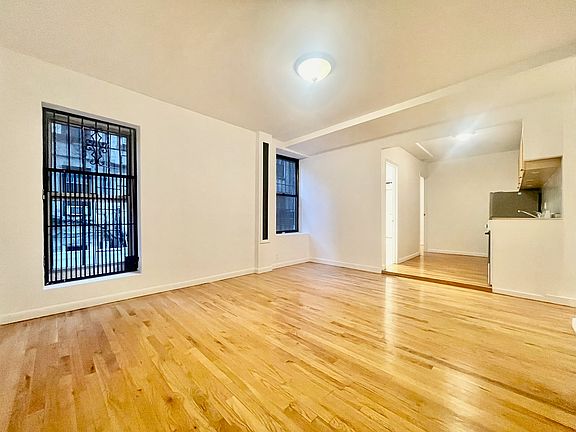 2nd image of 299 E 8th St APT 3