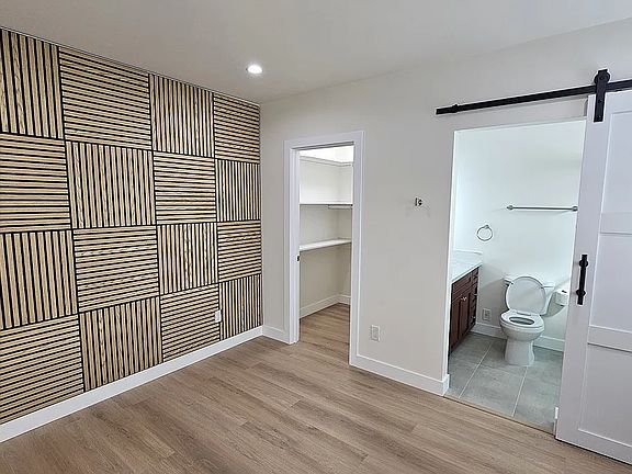 Acoustic wood panel accent wall.