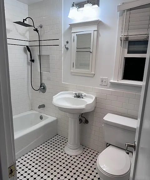 Bathroom one of two with deep closet