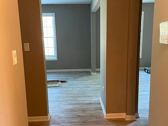 LOOKING TOWARD LIVING ROOM.  KITCHEN ON RIGHT, HALL TO BEDROOMS, BATH AND LINNEN CLOSET ON LEFT.