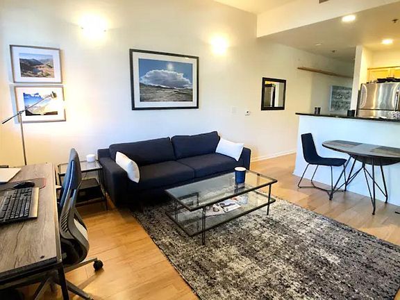 Cozy living room and dining area. Furniture not included.