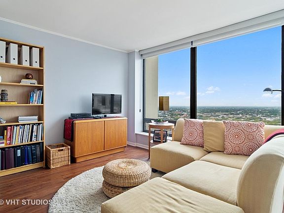 Unit unfurnished. Previous resident furniture, art shown.