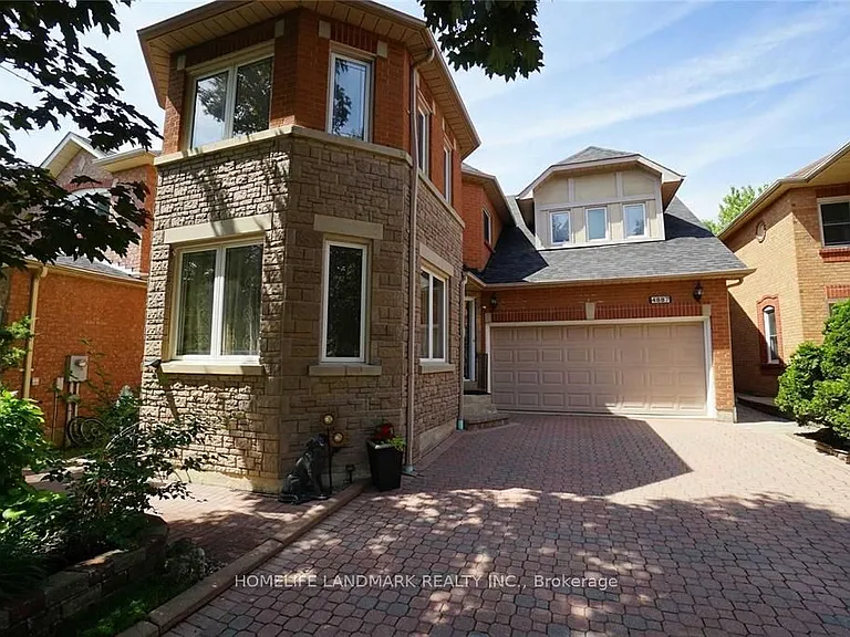 4887 Natkarni Cres — Photo 1
