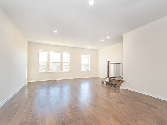 Open windows invite sunlight all throughout the main living space