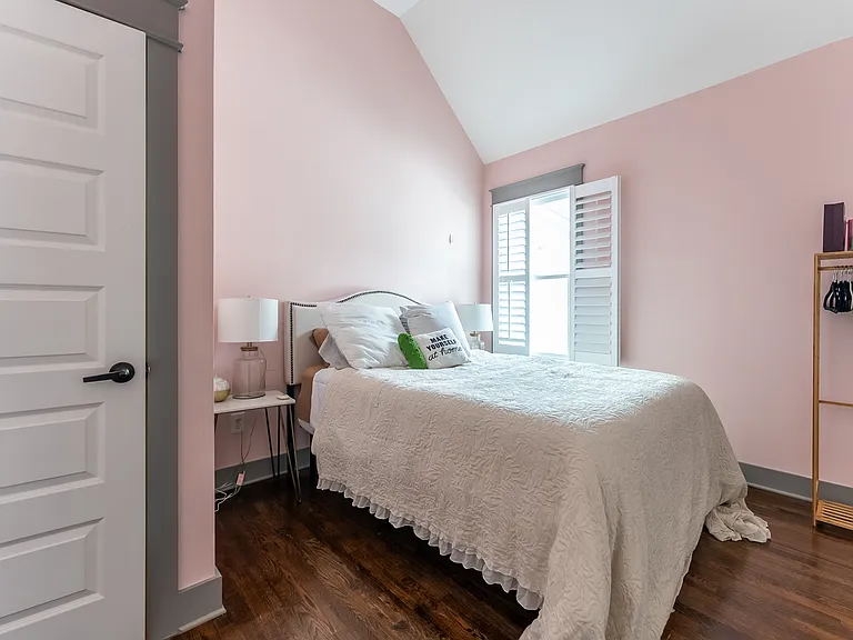 Spare bedroom next to bathroom, with large closet