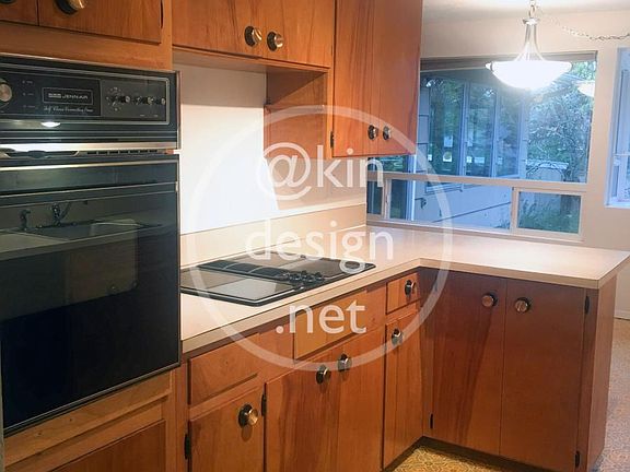 Kitchen with wall oven and jenn air cooktop