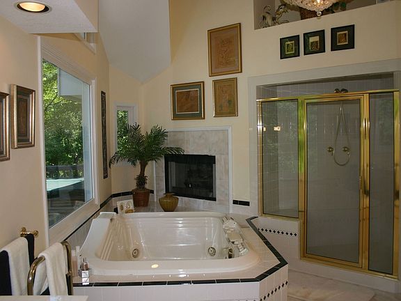 Master Bath features Jetted Tub & Fireplace