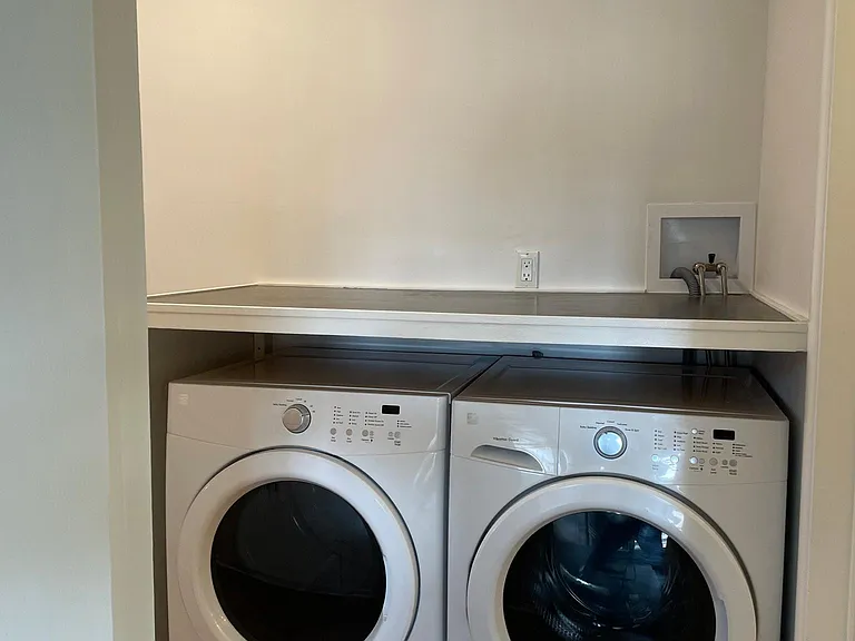 Full size washer and dryer with large countertop for folding clothes