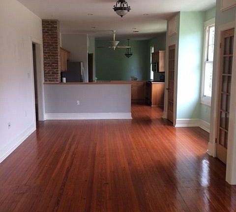 View of living room & kitchen from balcony