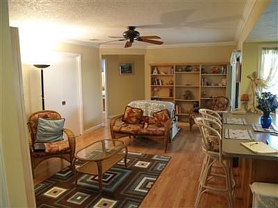 Great family room off kitchen, overlooks pool area. Split bedroom plan - One b