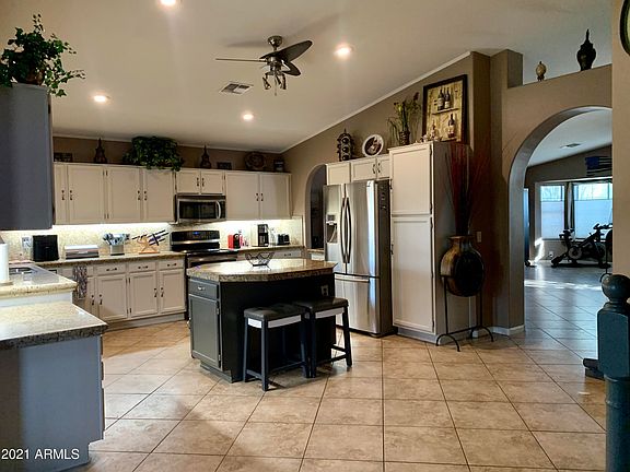 4th image of 8847 W Columbine Dr