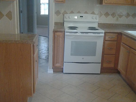 View from dining room. Refrigerator goes on the left side.