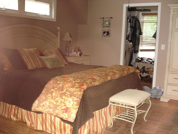 Master bed with walk-in closet