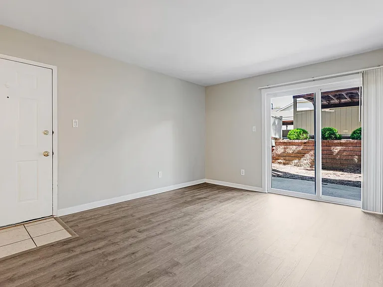 Living room with Patio view