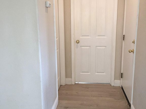 Downstairs Side Hall to Bedroom, Bathroom and Garage