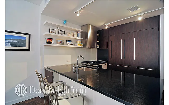 Sold by Douglas Elliman | media 11