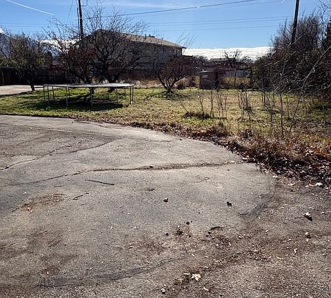 Circular Driveway that goes around the back of the house.