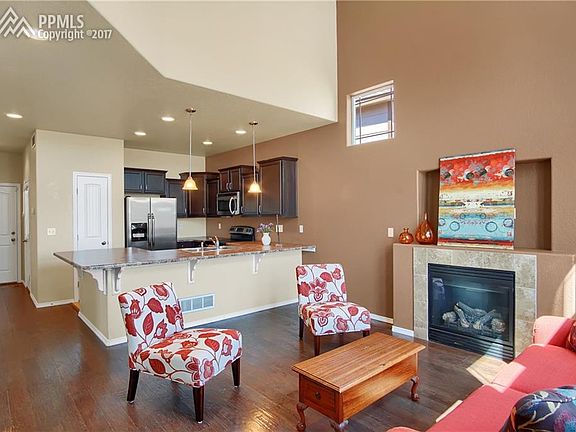 Main floor living room open to kitchen