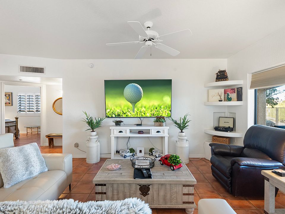 Living room with 75 " screen. Great "man cave!"