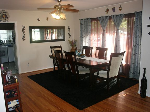 Dining room. On the left is the kitchen; to the right is the front door.