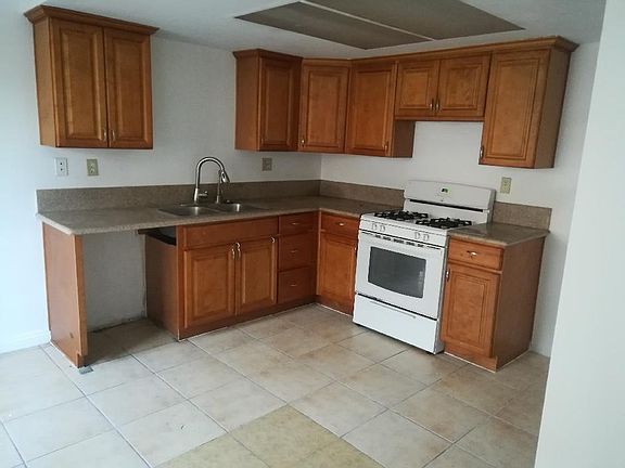 Granite countertop and newer kitchen cabinets