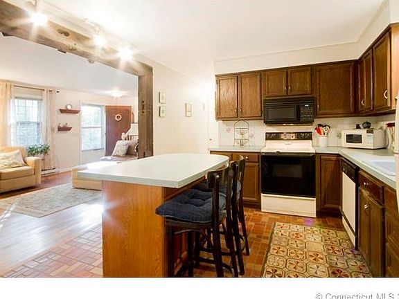 Kitchen with Island opens to living room.