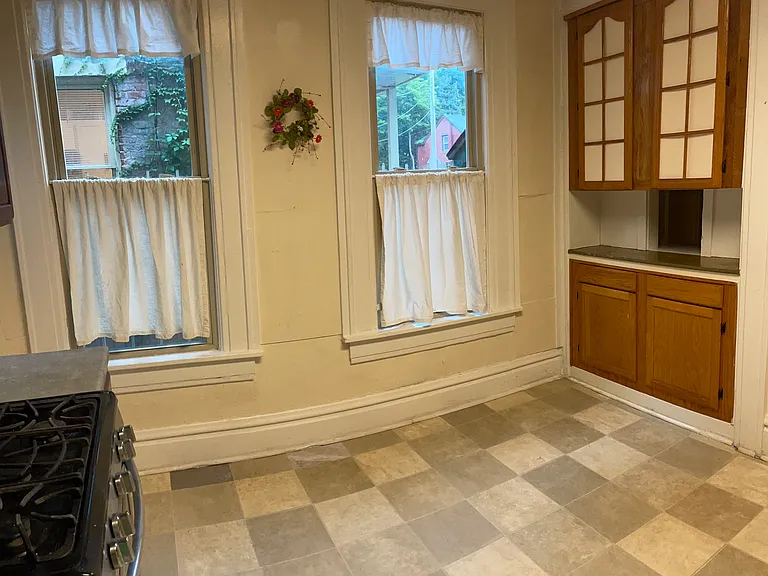 2 windows and extra room for a table and chairs.