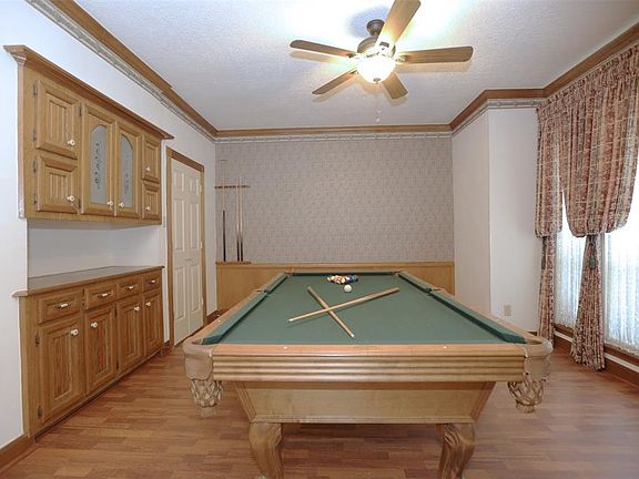 Dinning room is large enough for a pool table. Don't forget to check out the custom buffet!