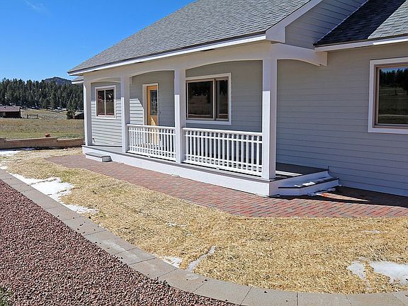 veranda and brick sidewalk