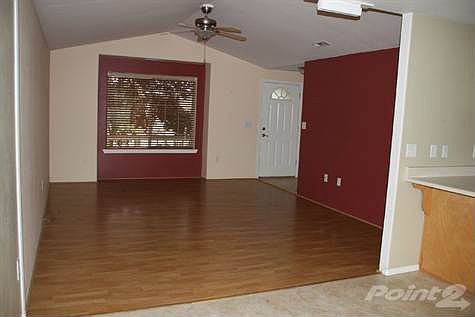 Living Room and Entry Door from Dining Area