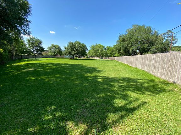 View of backyard looking toward house