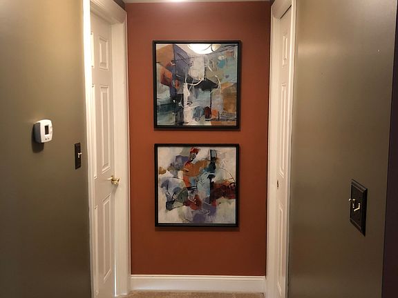 Hallway to MB and 1/2 bath