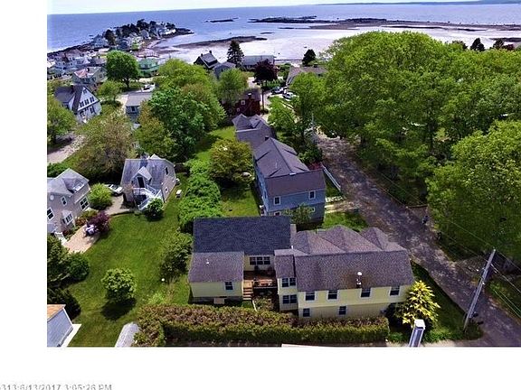 Subject home, yellow, showing proximity to the water
