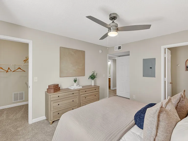 Spacious primary bedroom with ceiling fan in Murfreesboro, TN apartment home