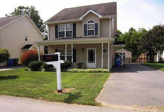 Front of the house with ample parking space for 2+ cars