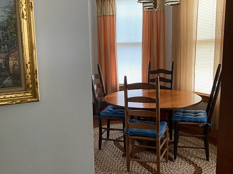 DR area provides just enough of a tucked away feeling...along with the chandelier dimmer switch for ambiance
