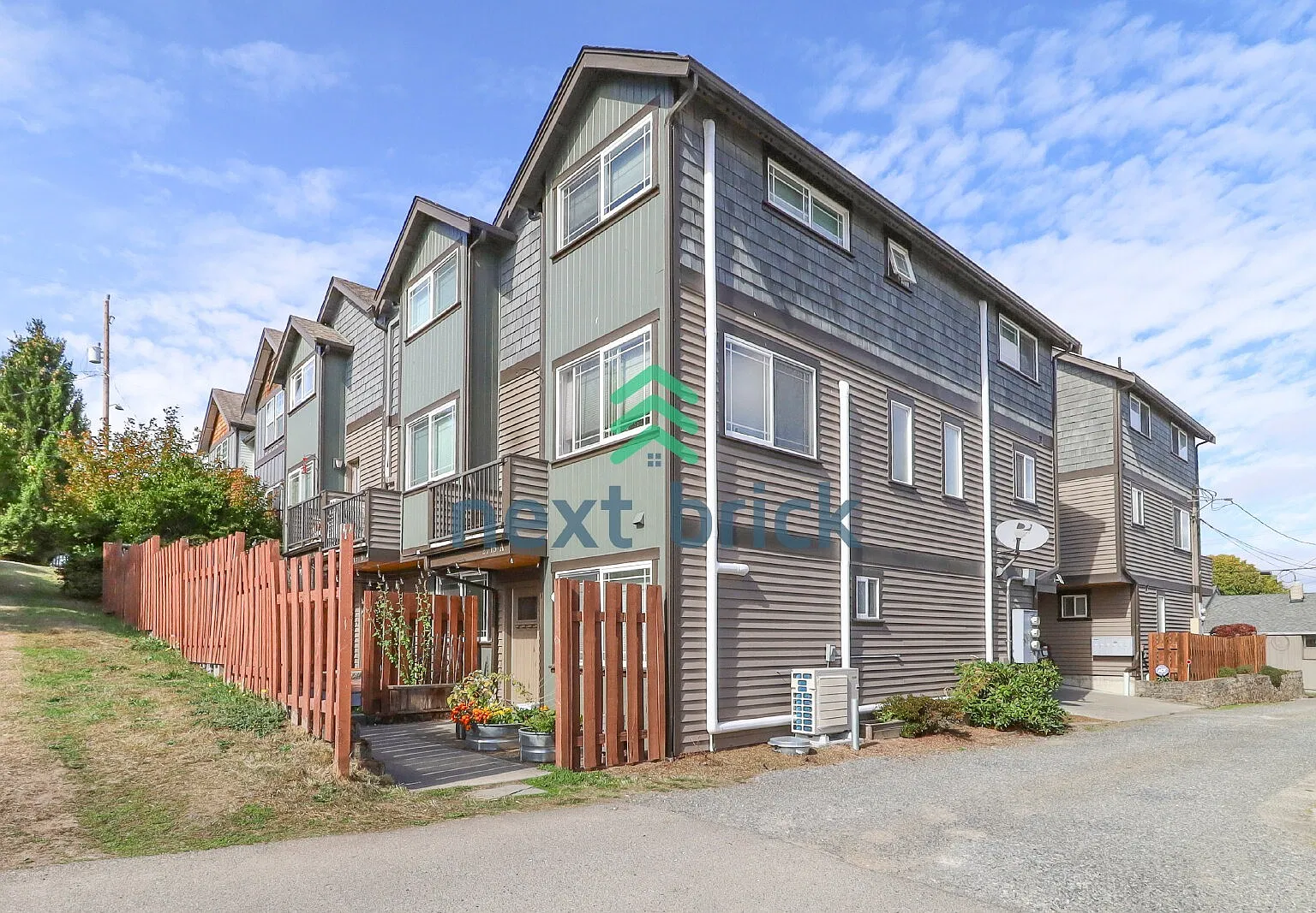 "Chic Seattle Living: Spacious 3-Bed Townhouse with 2 Baths on W Jameson St!" — Photo 1