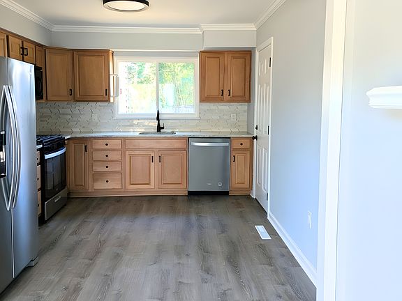 Kitchen area attached to living room