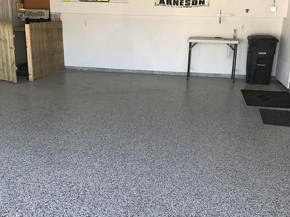 Garage with dog kennel.