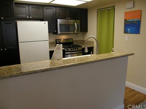 Newly remodeled kitchen.  It's absolutely gorgeous, with all new cabinets with easy-glide drawers, granite countertops, new flooring, in an open floor plan to the living and dining areas.