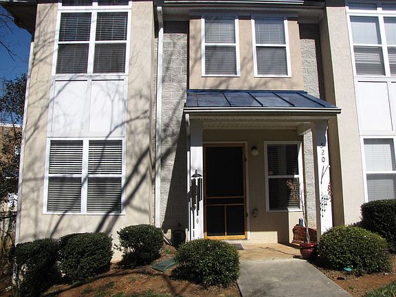 Located at end of courtyard