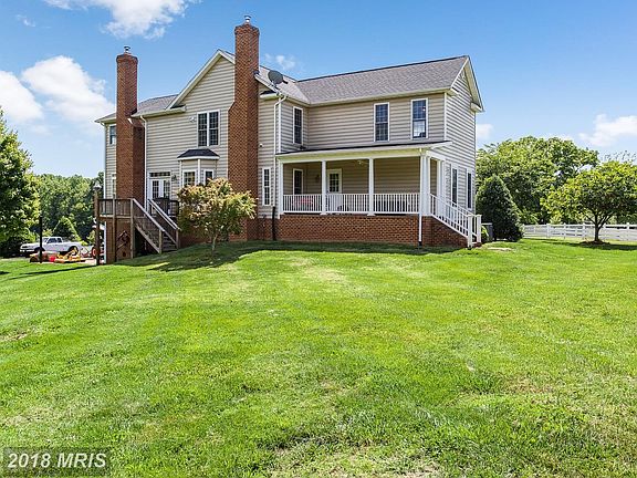 Porch measures approximately 26'.