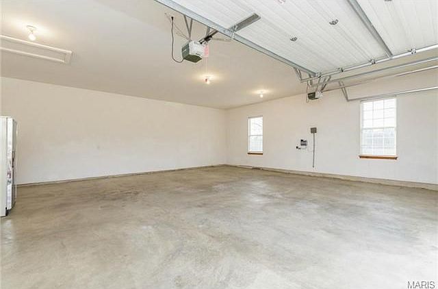 2 - Oversized 30'x 30' insulated garages. One is attached. The o