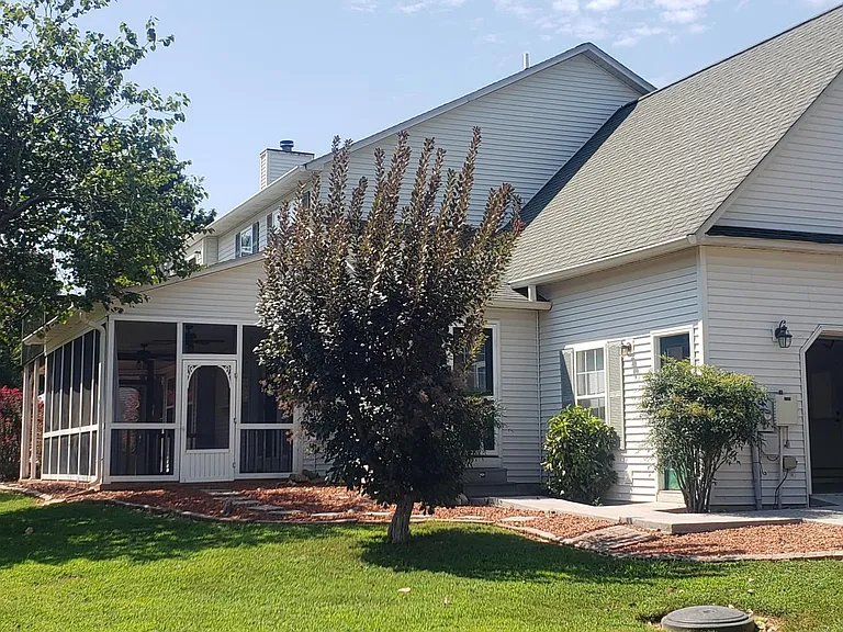 2.5 car garage and screened in patio