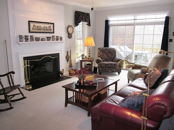 Spacious family room w/ fireplace & slider to deck