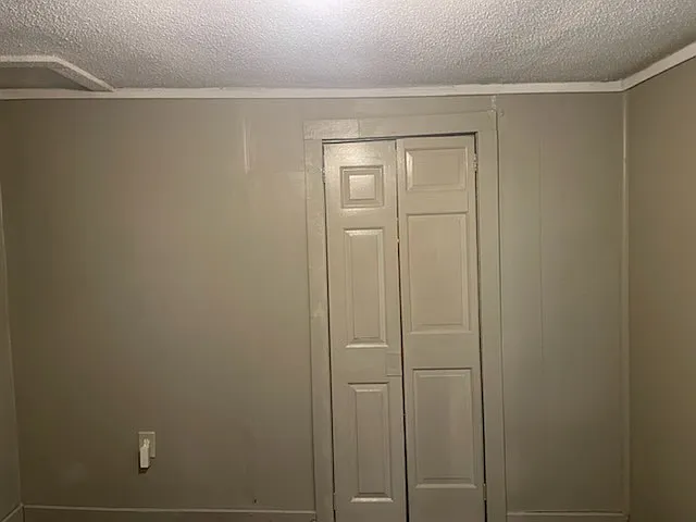 BEDROOM 1 WALK IN CLOSET DOORS