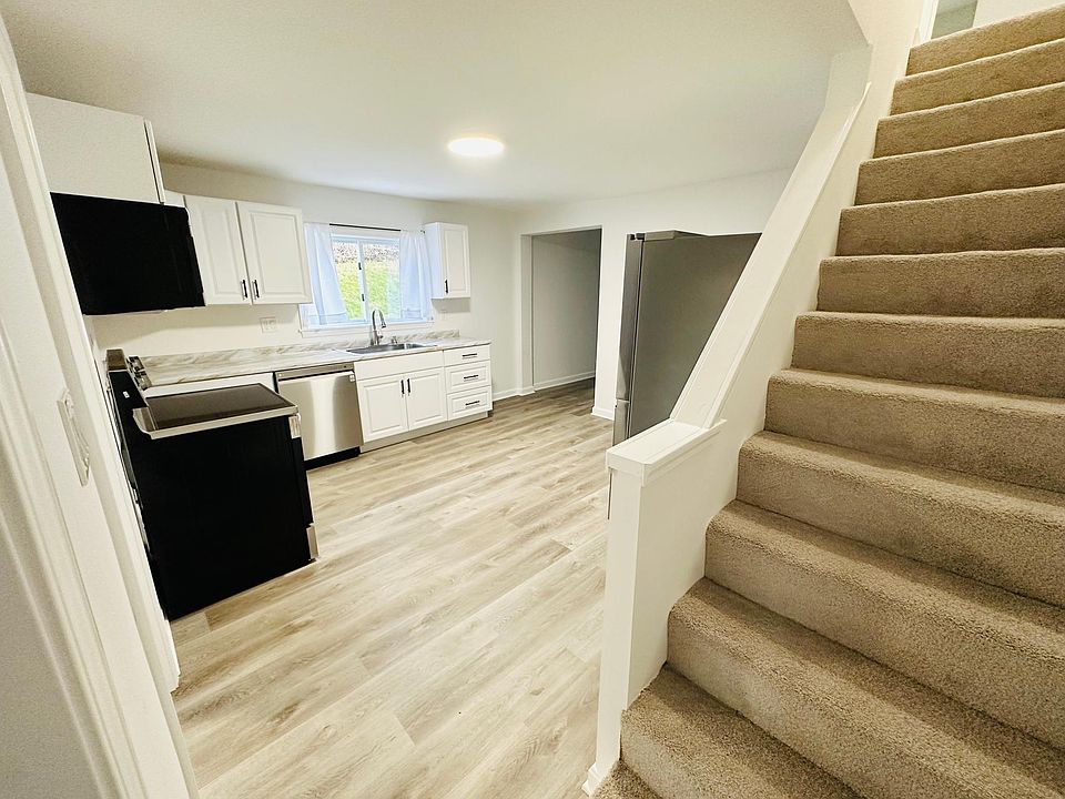 Kitchen leading to 2nd floor