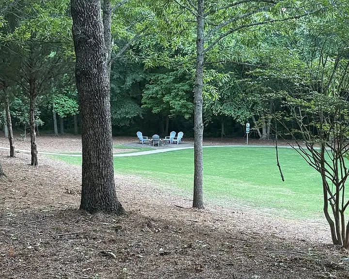 Beautiful park directly across the street; exercise, relax, play team sports and brick firepit.