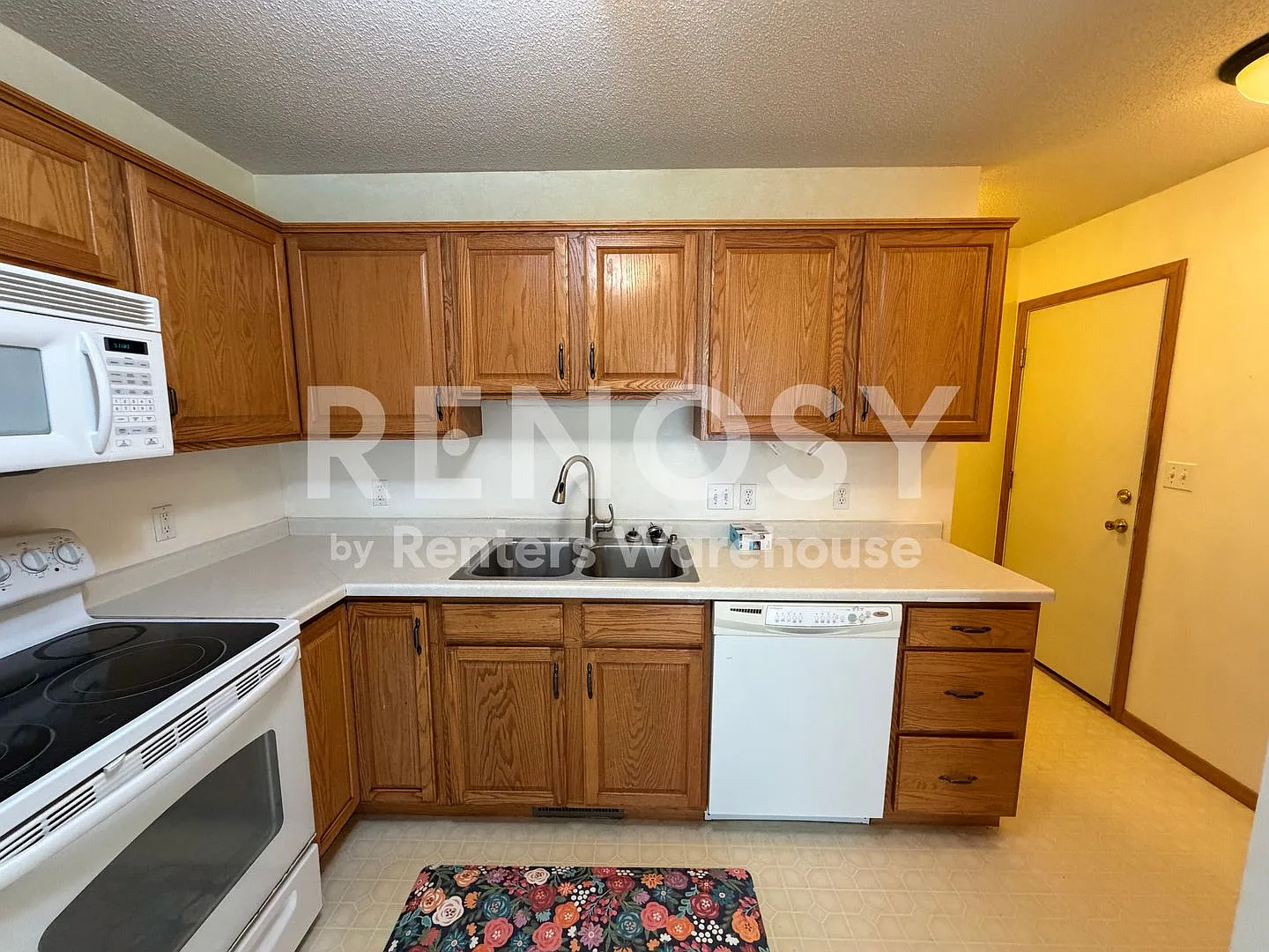 Available Now! Spacious 3 Bedroom Home with Large Backyard & Family Room | 3325 7th St NW, Roches... — Photo 3